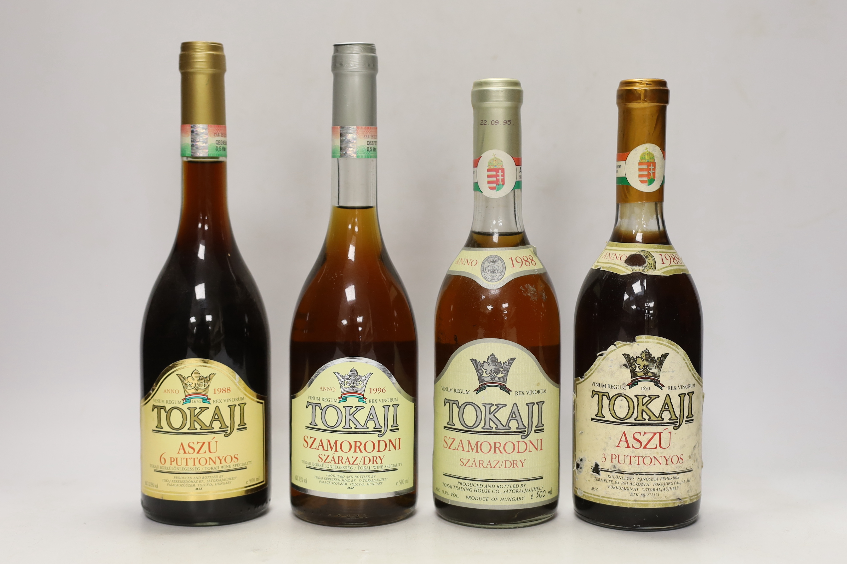 One bottle of Tokaji Szamorodni Szaraz, 1996, one bottle of Tokaji Szamorodni Szaraz, 1988, one bottle of Tokaji Aszu 6 Puttonyos, 1988 and one bottle of Tokaji Aszu 3 Puttonyos, 1988.